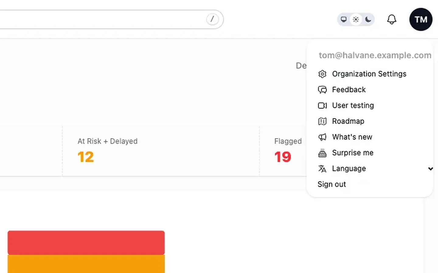 The application's own user menu is open. The menu lists organisation settings, feedback, user testing, roadmap and what's new, with sign out